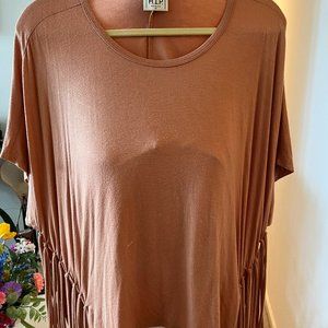 HIP  TOP WITH FRINGES ON BOTH SIDES IN THE OF THIS TOP SIZE M  NEW /W/O TAGS